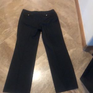 St. John Sport classic SJ elegance. Two front pockets and two in back.